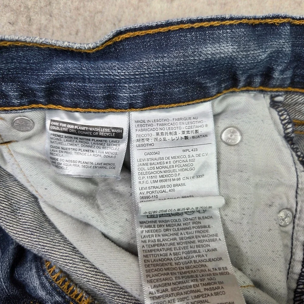 Levi's 559 Jeans Men's Size 34x32 Blue Fade Denim Straight Leg Fit‎ Distressed